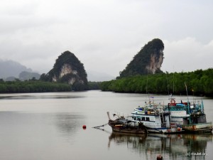 Khao Kanab Nam, the symbol of Krabi, two karst rocks.