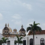 Colonial architecture and palms.