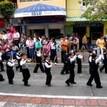 Dancing parade of small school boys.