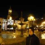 Beautiful girl in front of the Plaza de Armas.